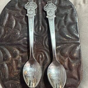 Rolex Zurich spoons from Switzerland. 4 3/4" long. Beautiful condition.